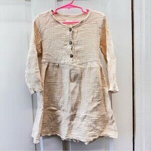 off white muslin dress with cute button details and tie back sie 110 4t